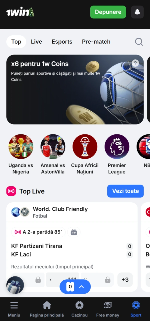 Navighează spre secțiunea de pariurile pre-meci sau live în aplicația 1win.